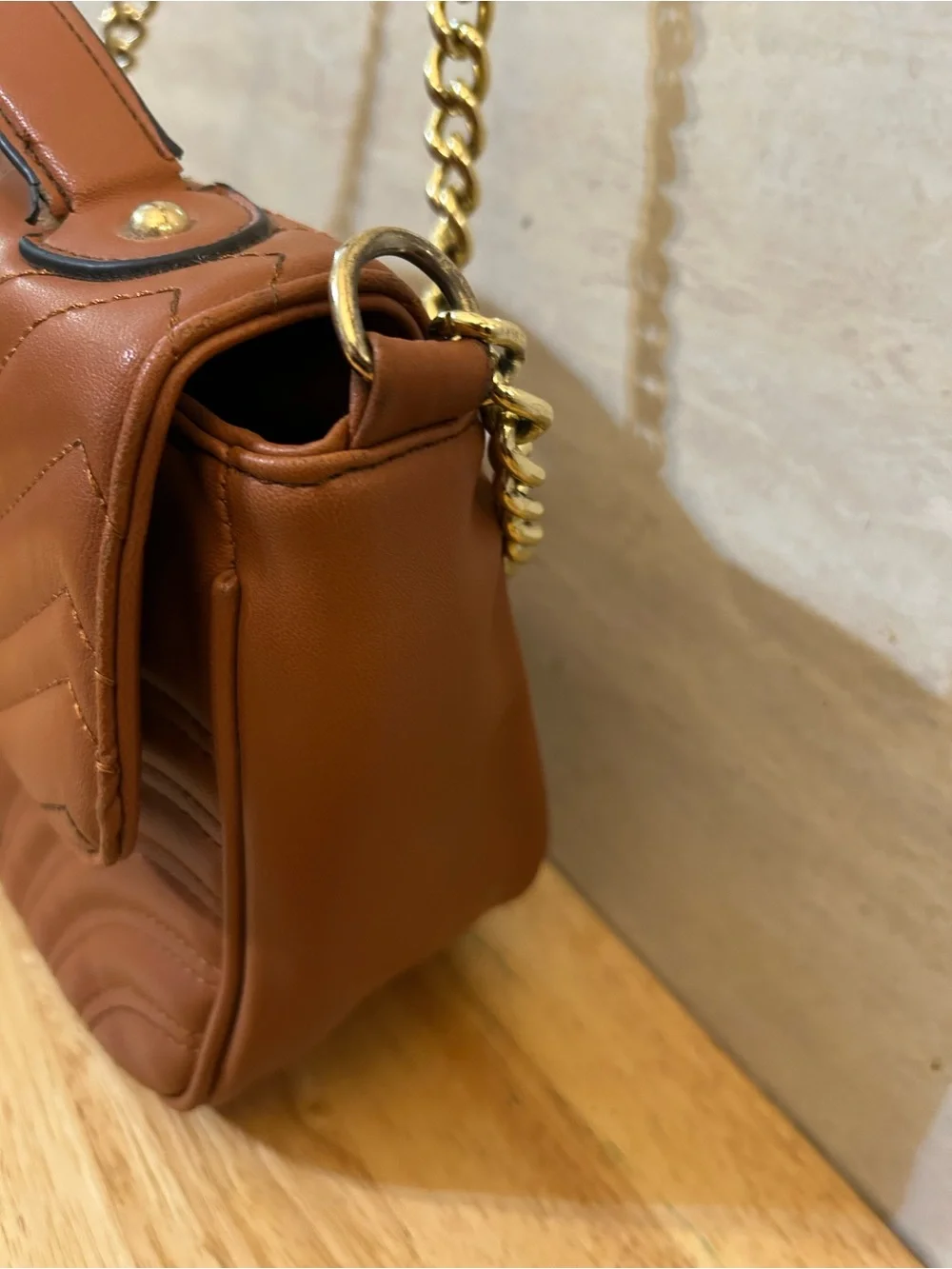 Designer Inspired brown quilted handbag featuring an interlocking double-G logo